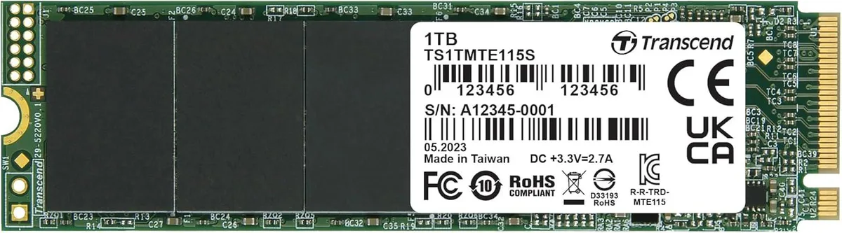 Thin green circuit board with black memory chips and gold edge connector