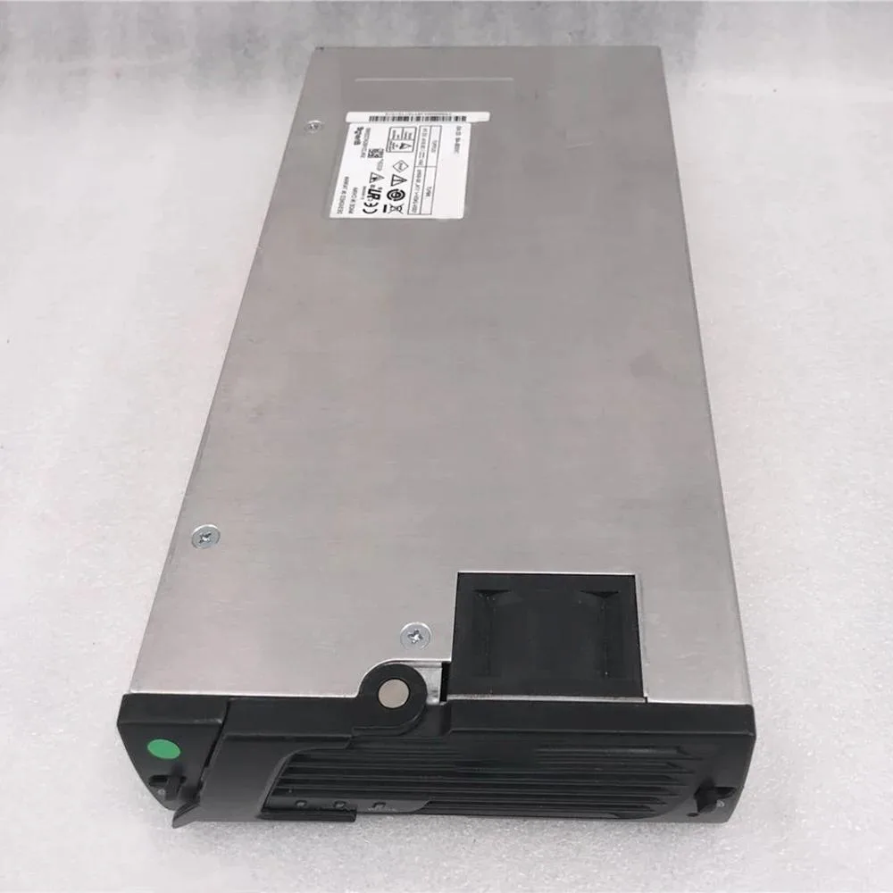 Rectangular silver power supply module with front handle and ventilation grille