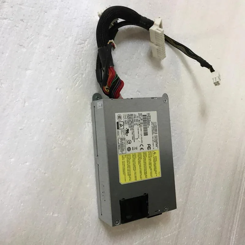 Rectangular silver ATX power supply unit with rear fan grille and modular cable sockets