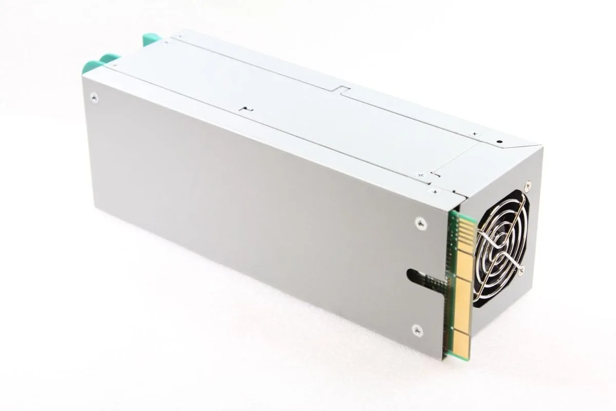 Rectangular silver server power supply unit with rear exhaust fan and power socket