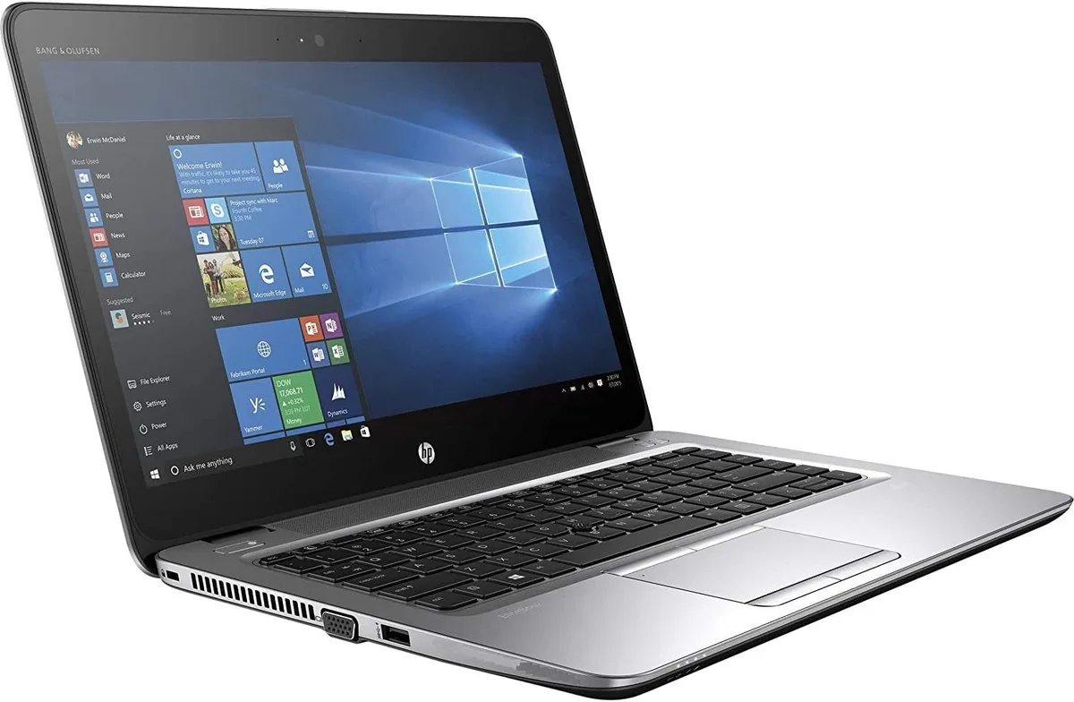 Silver business laptop with 14 inch matte display and spill resistant keyboard