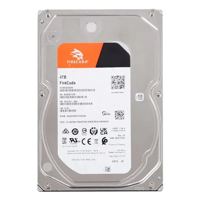 Silver 3.5 inch bare hard drive with exposed circuit board
