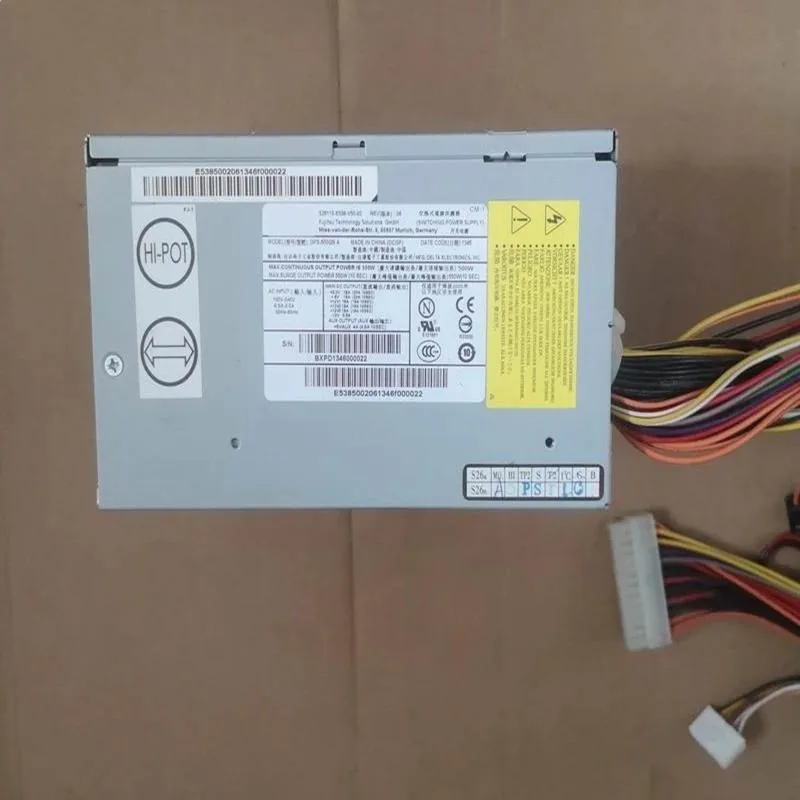 Rectangular ATX power supply unit with metal casing and cooling fan visible