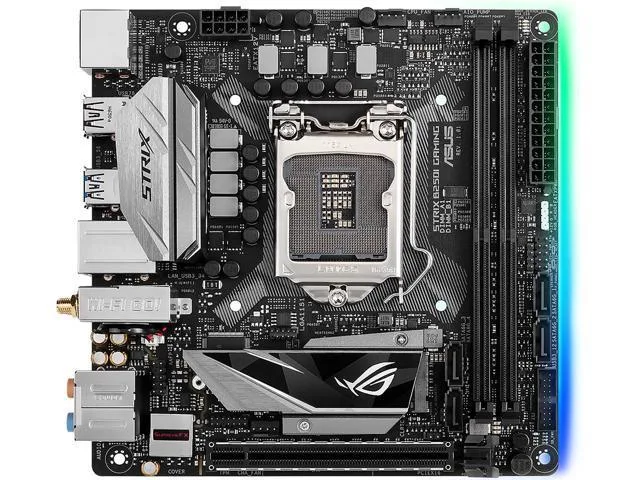 Compact Mini-ITX motherboard with black PCB, silver heatsinks and integrated I/O shield