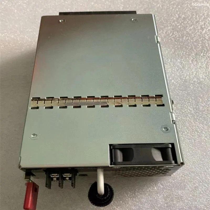 Silver ATX power supply unit with fan grille and cable bundle