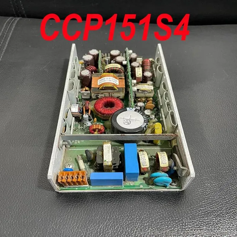 Rectangular ATX power supply unit, matte metal finish, fan grille visible