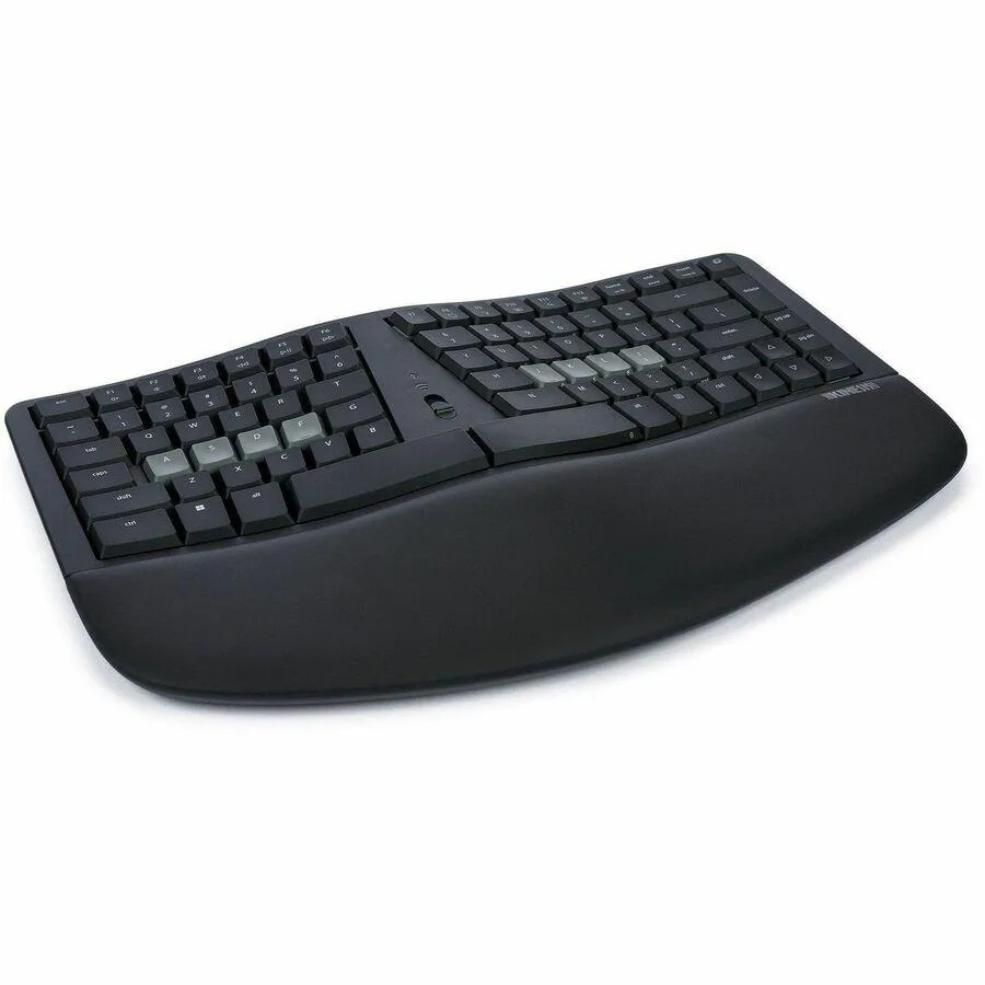 Split ergonomic mechanical keyboard with tented halves, integrated palm rests and backlit keys