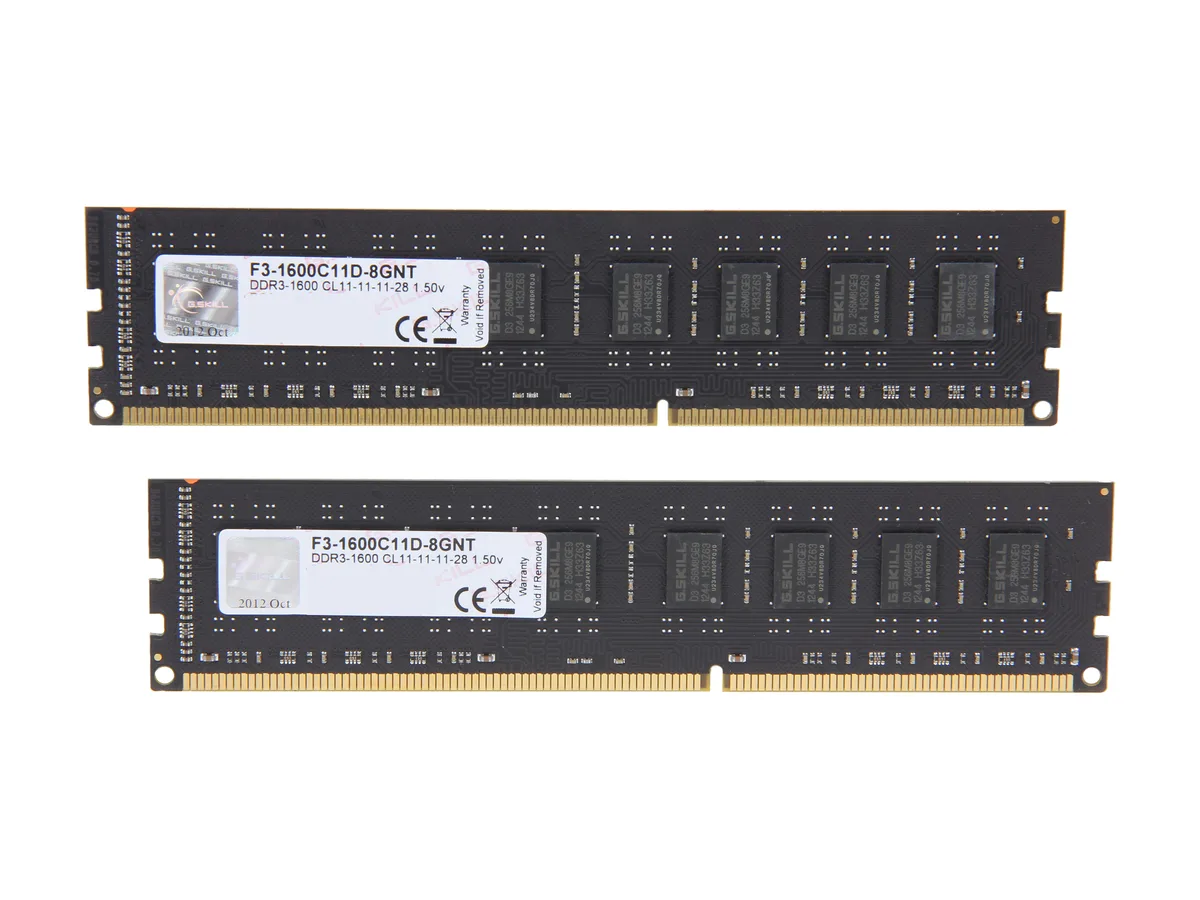 Two green DDR3 desktop memory modules with black heat spreaders and gold contacts