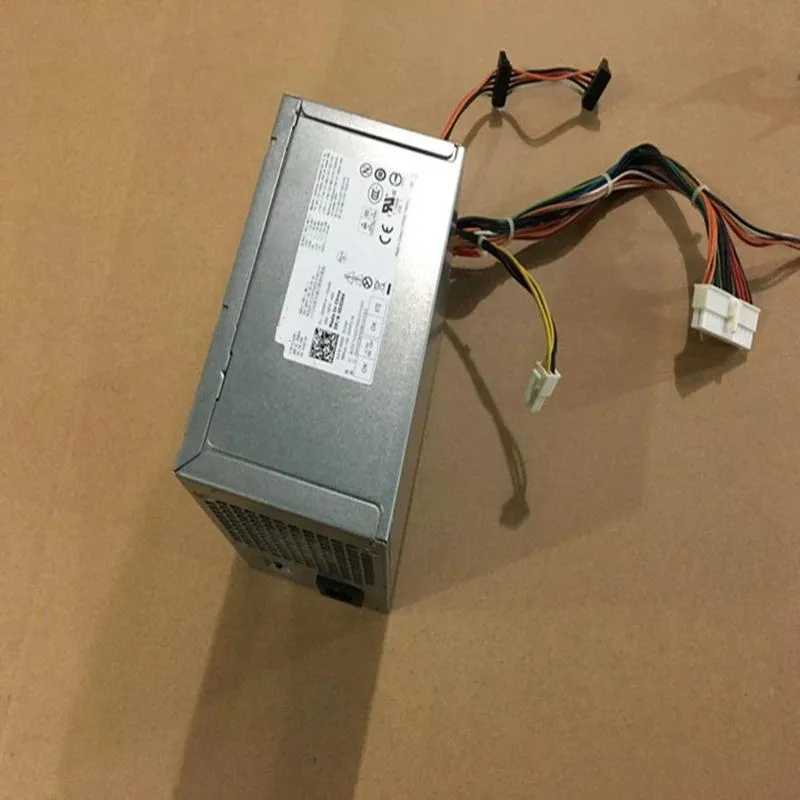 Black rectangular ATX power supply unit with cooling fan grille and cable bundle
