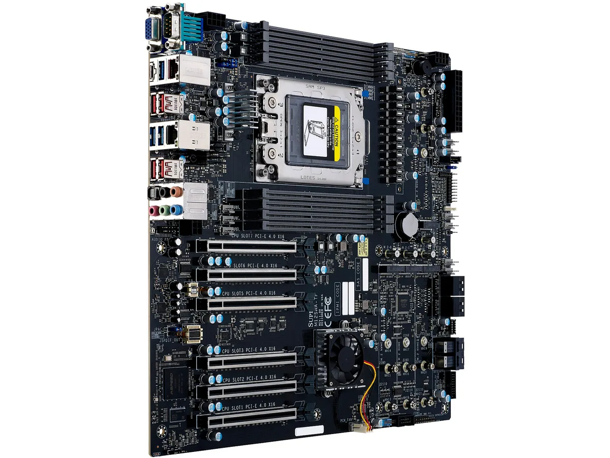 Large rectangular green circuit board with silver sockets and black expansion slots