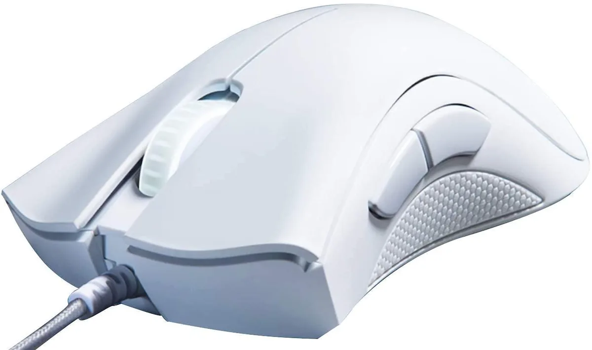 White ergonomic right-handed gaming mouse with rubber side grips, ridged scroll wheel, five buttons, wired USB connection