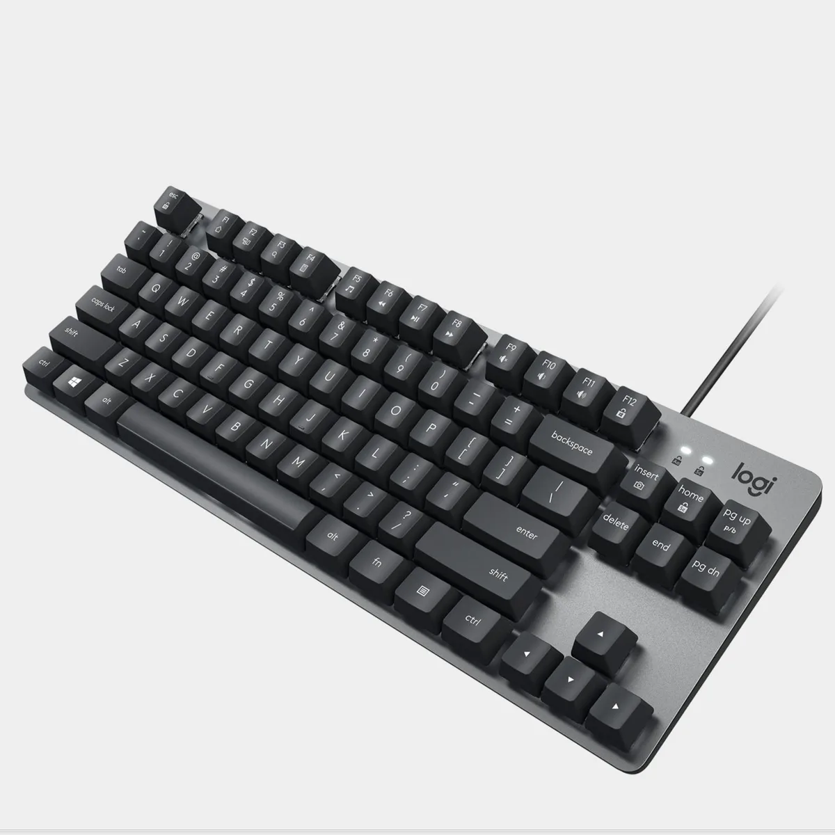 Black compact mechanical keyboard with aluminium top, red linear switches and 84 keys