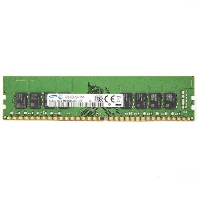 Green rectangular circuit board with black memory chips and gold edge connectors