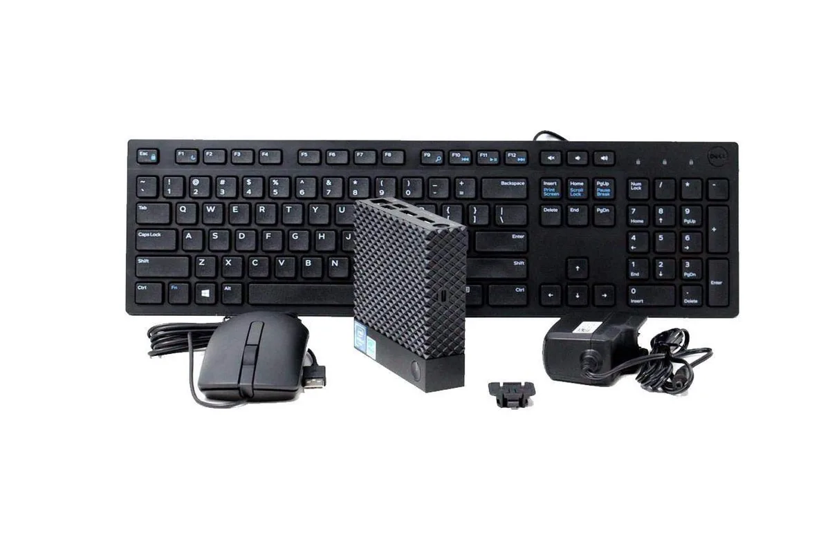 Small black rectangular thin client with keyboard and mouse