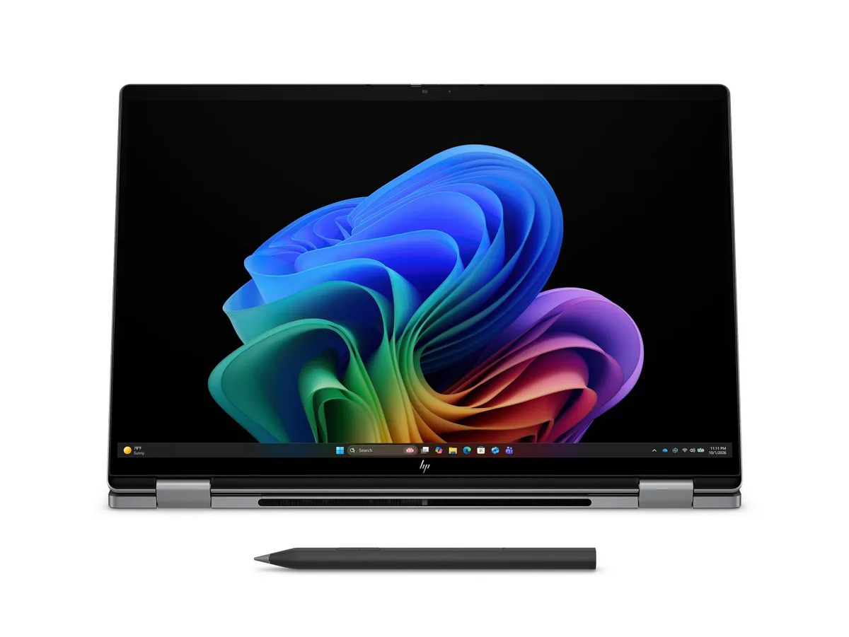 Silver 16-inch 2K OLED touchscreen convertible laptop with edge-to-edge glass