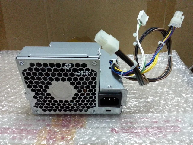 Compact silver metal SFF desktop power supply unit with single fan and fixed cables
