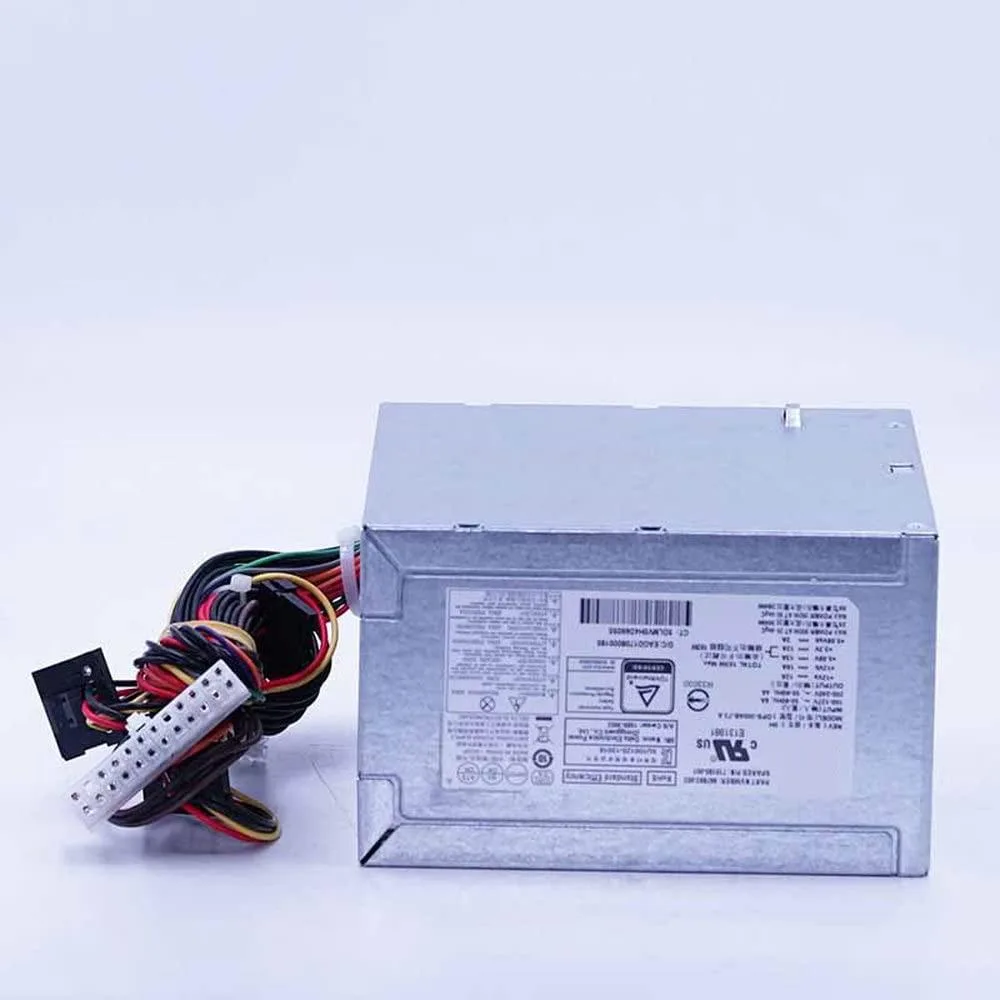 Silver rectangular AT power supply unit with ventilation grille and power connectors
