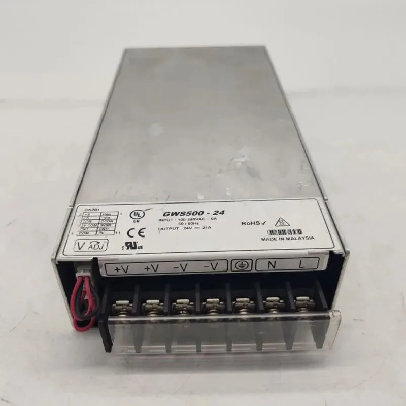 Rectangular silver ATX power supply unit with fan grille and power socket visible