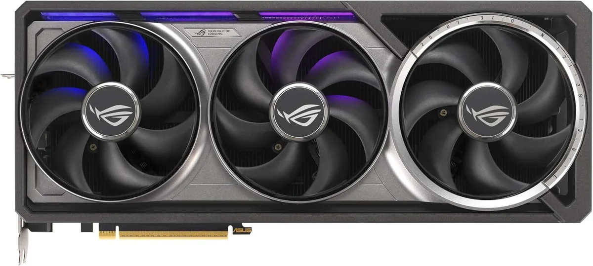 Large black triple-slot graphics card with three axial fans and RGB lighting