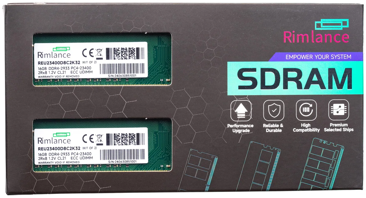 Two green DDR4 UDIMM sticks, black chips, gold contacts
