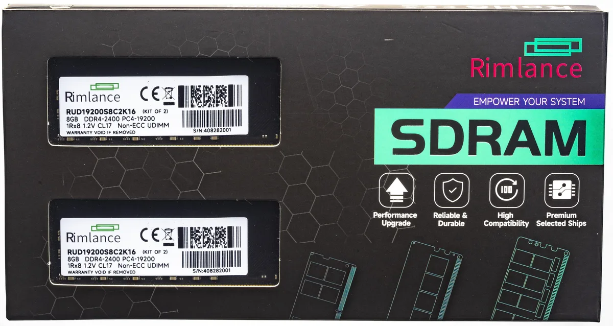 Two green circuit boards with black memory chips and gold contacts