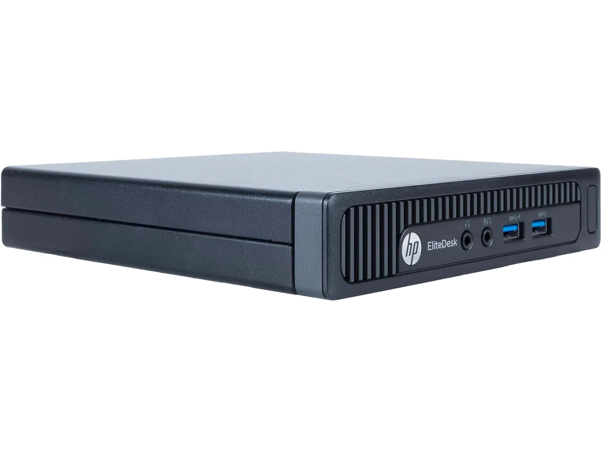 Small black rectangular Mini PC with front USB ports