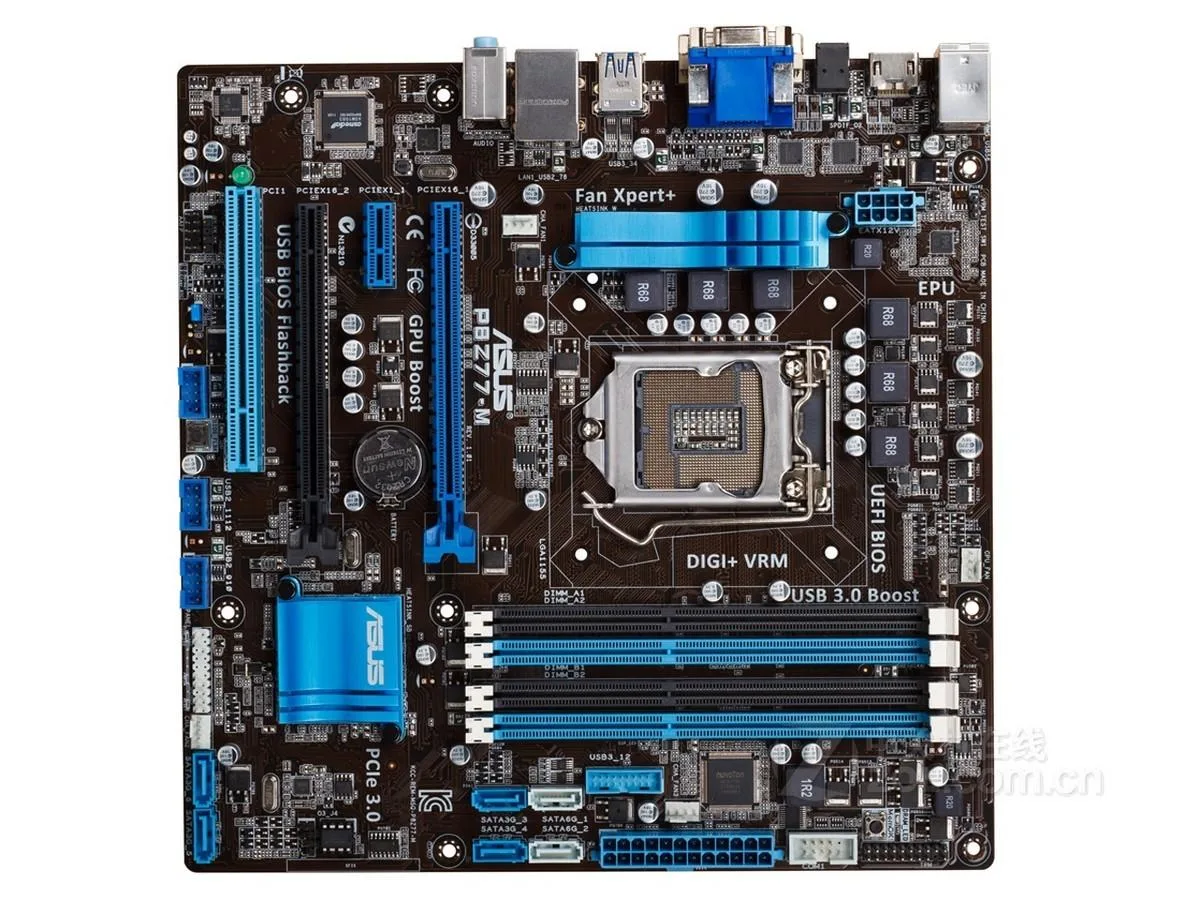 Green micro-ATX motherboard with silver LGA 1155 socket, black DDR3 slots, blue SATA ports, silver heatsinks, rear I/O shield included