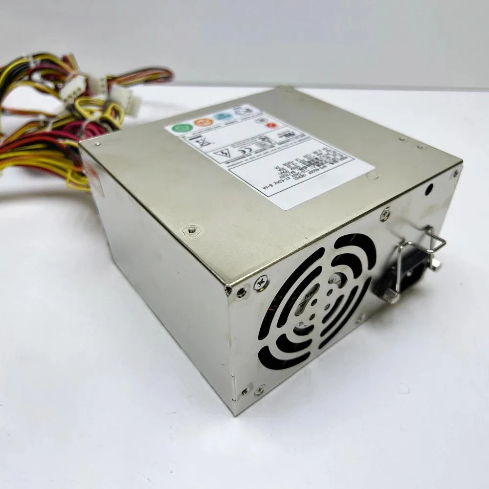 Silver rectangular server power supply unit with rear fan grille and power socket