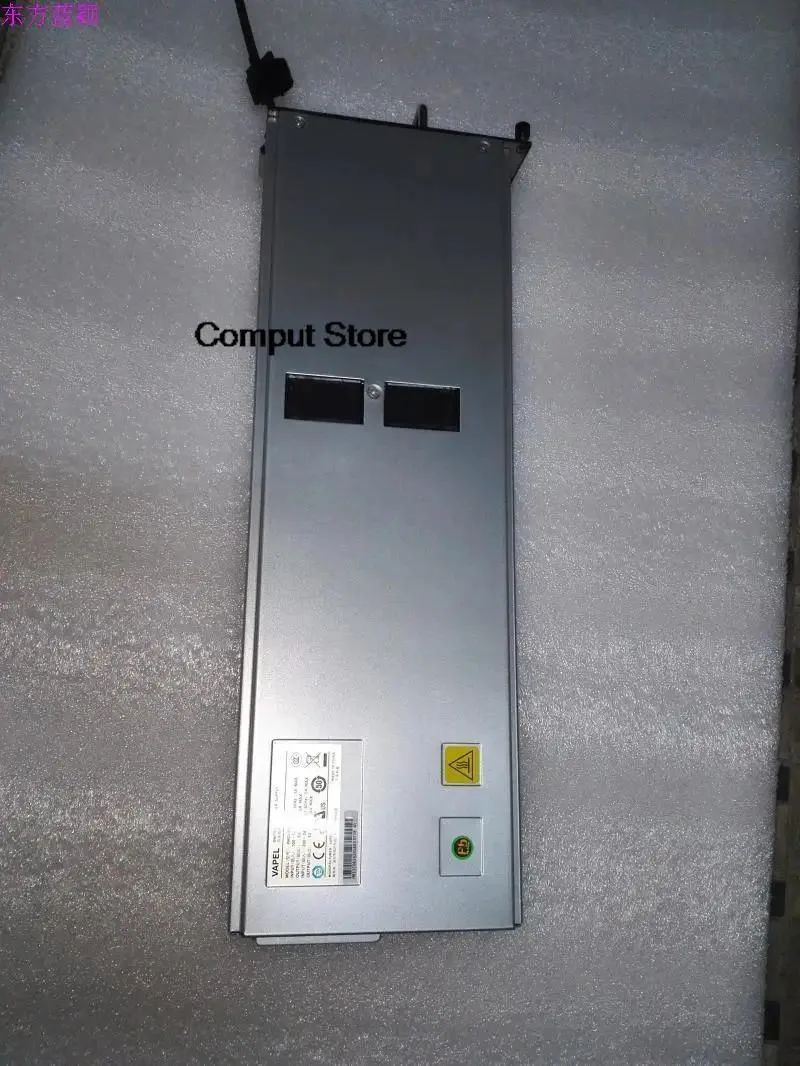 Rectangular black ATX power supply unit with fan grille and cable bundle