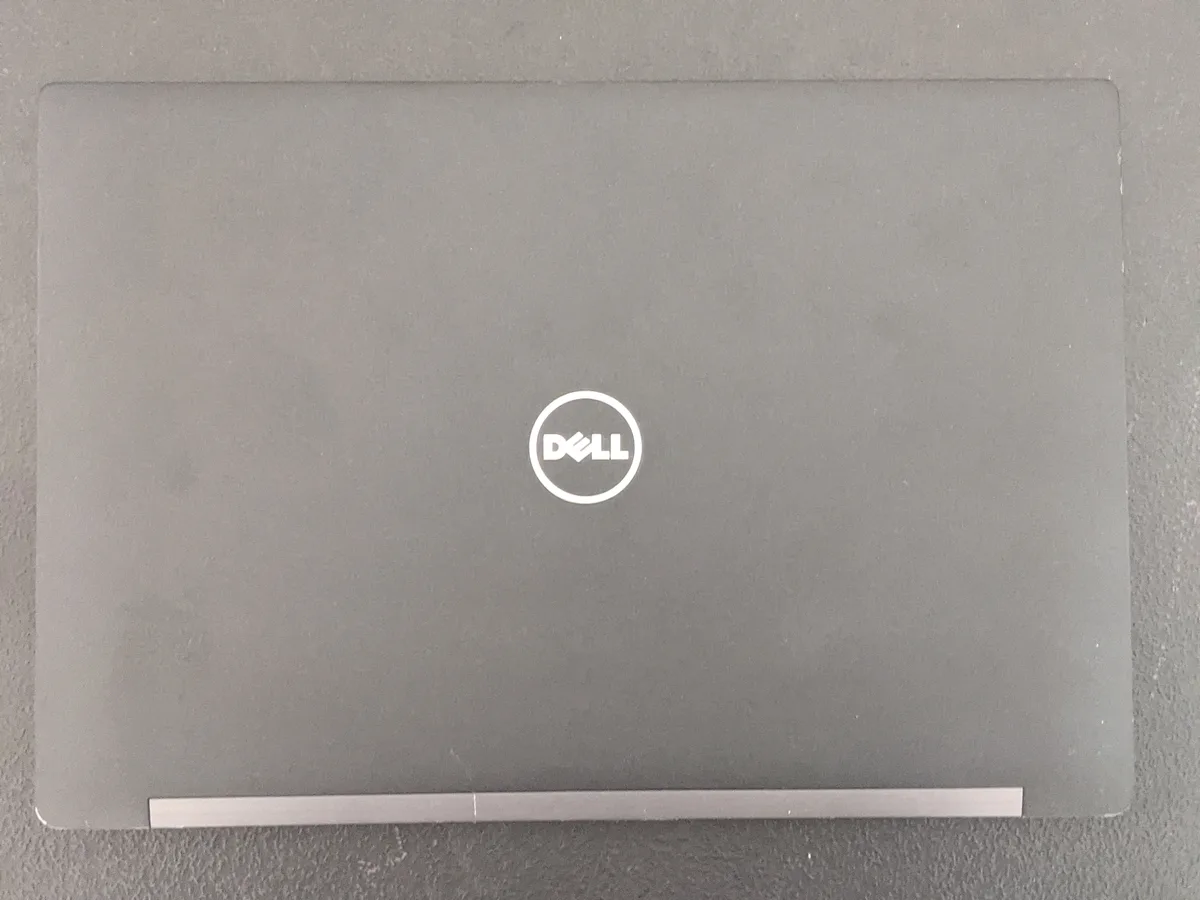 Black Dell Latitude E7280 12.5 inch laptop with bright spot at bottom of screen