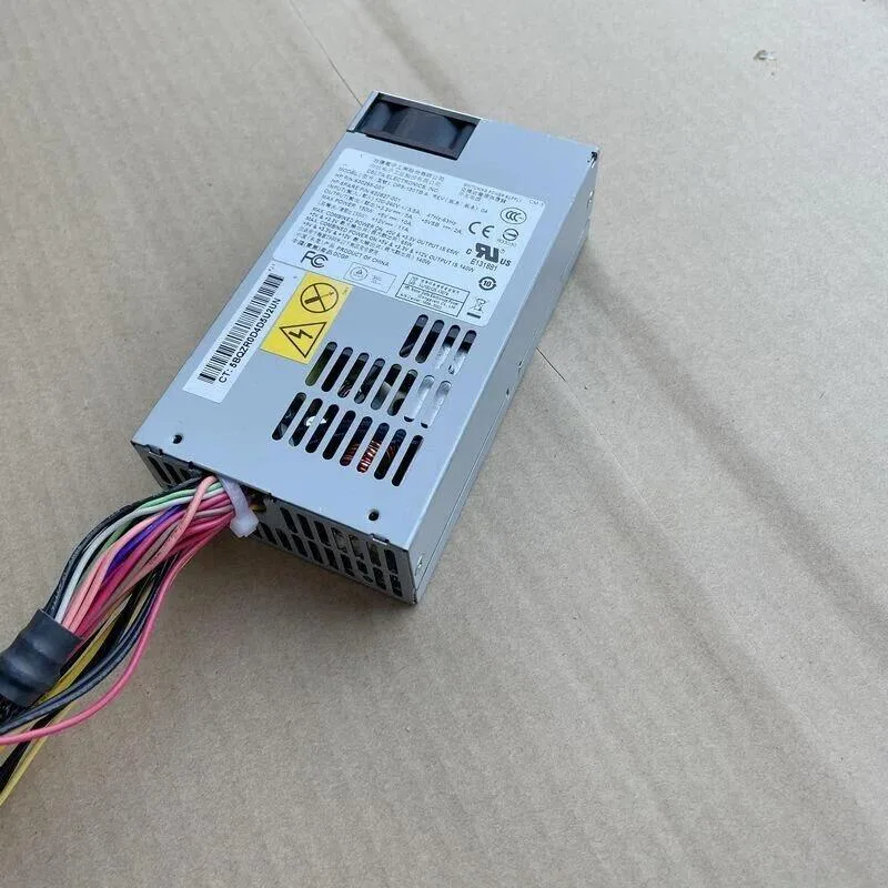Compact 1U silver power supply unit with rear fan grille and side label