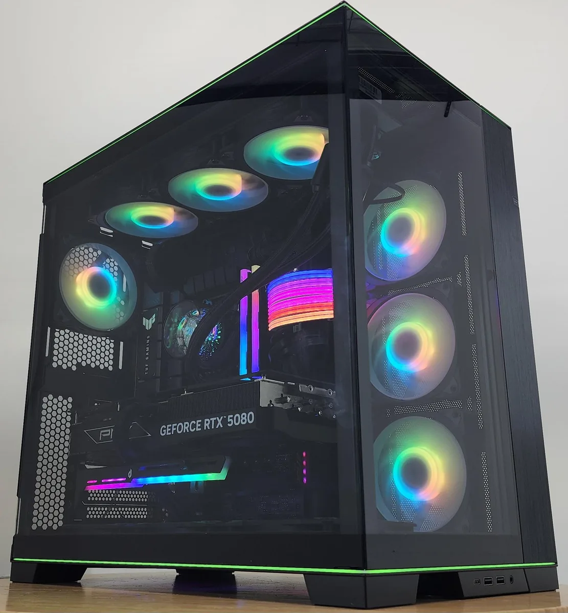 White Lian Li O11 Dynamic EVO RGB case with glass panels showing 360mm AIO RGB cooler, RTX 5080 graphics card