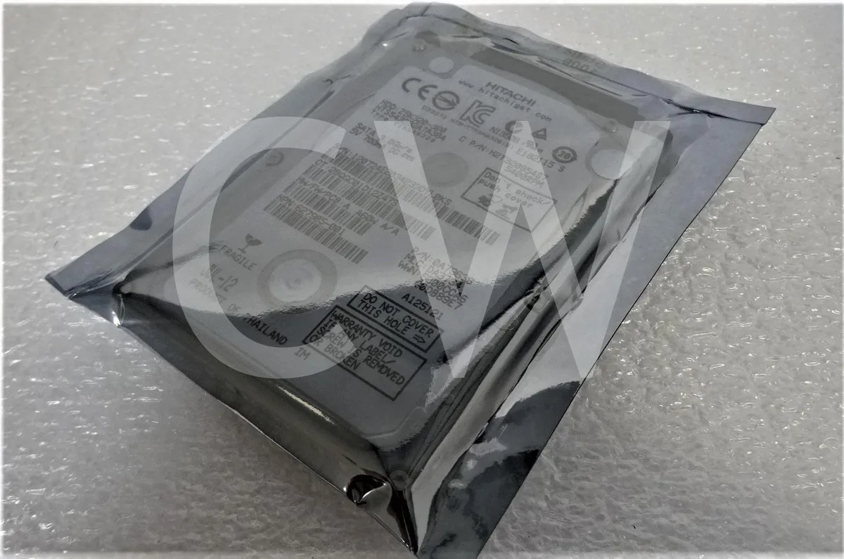 Silver rectangular 2.5 inch SATA hard drive with label showing HP part number 627985-001