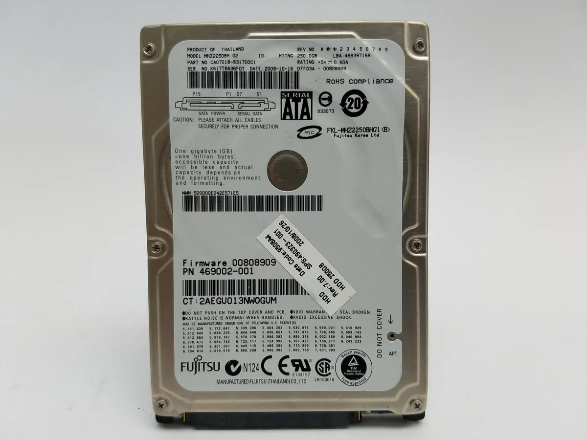 Silver 2.5 inch SATA hard drive with circuit board visible