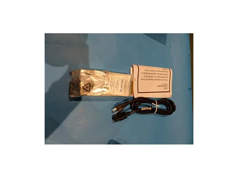 Rectangular silver metal power supply unit with rear fan grille and side label