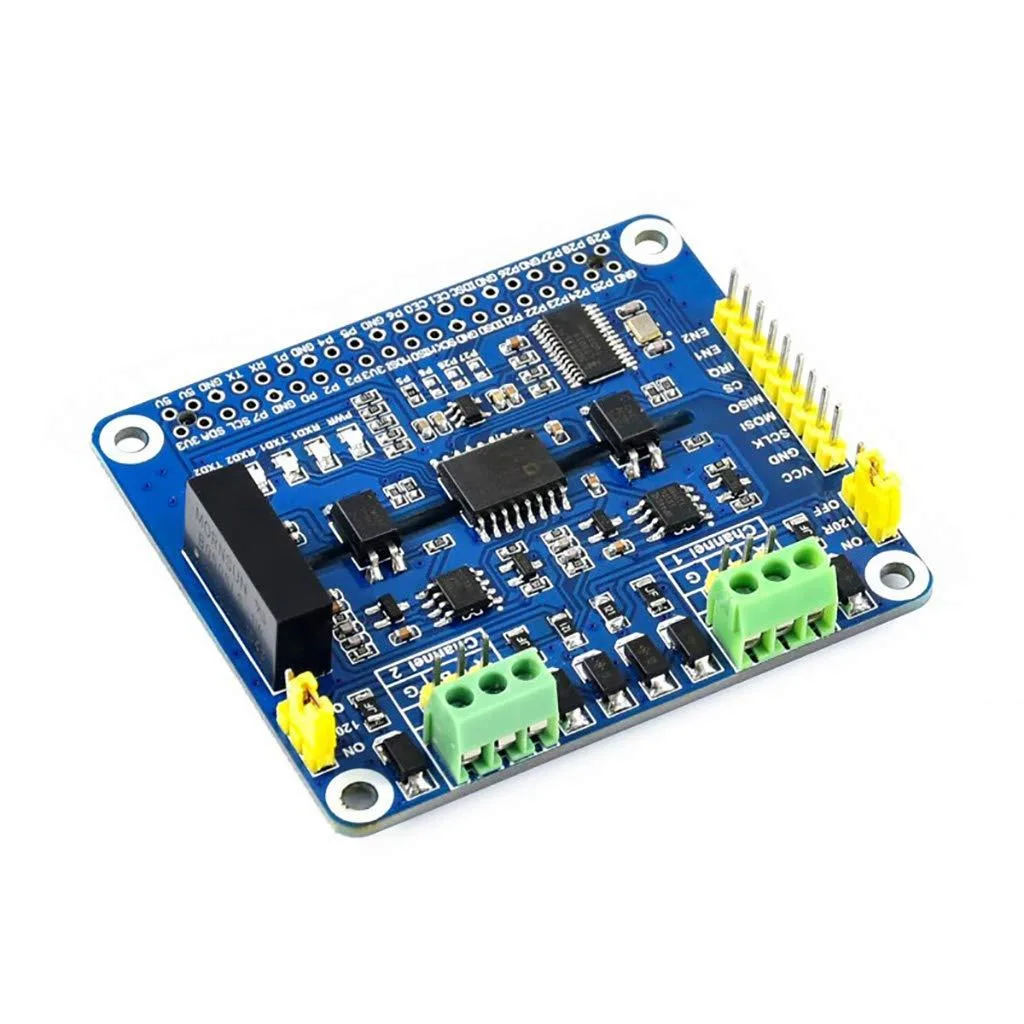 Green circuit board with 40-pin header, two terminal blocks, DIP switches and indicator LEDs