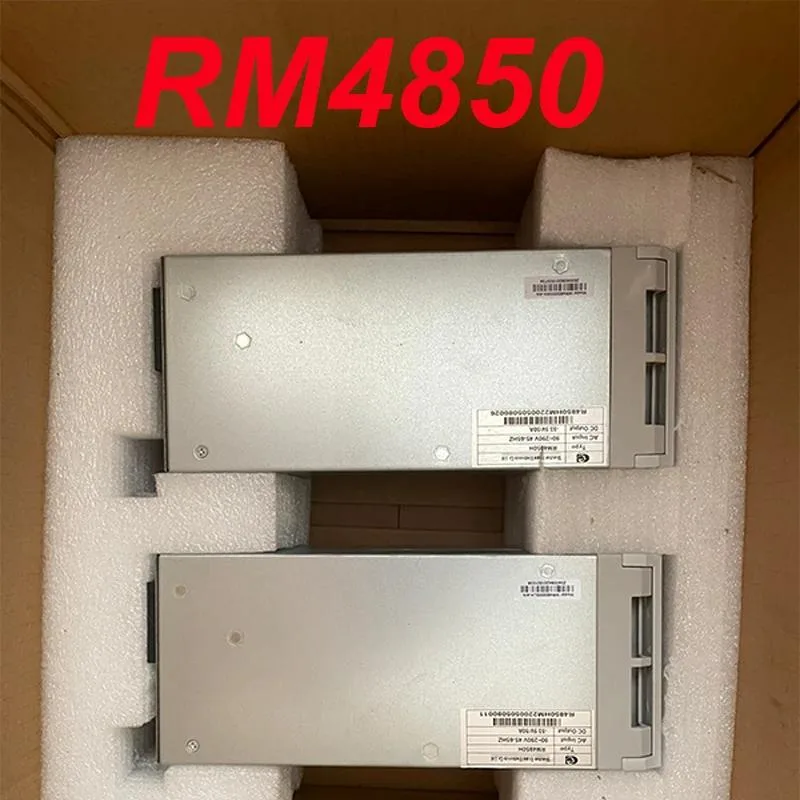 Rectangular ATX power supply unit with metal casing and cooling fan visible