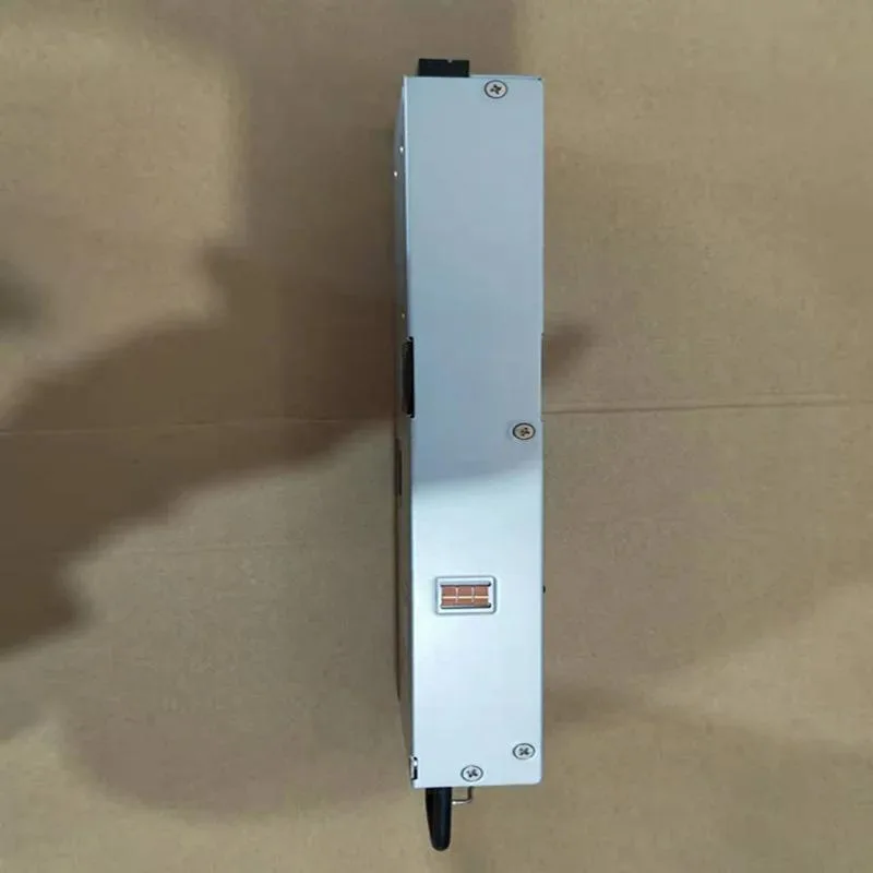 Rectangular black ATX power supply unit with fan grille and power socket visible