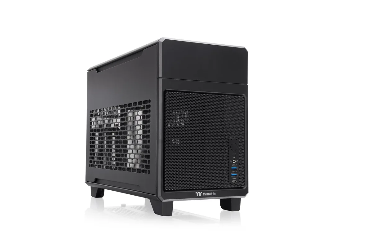 Compact black Mini-ITX steel case with mesh side panel