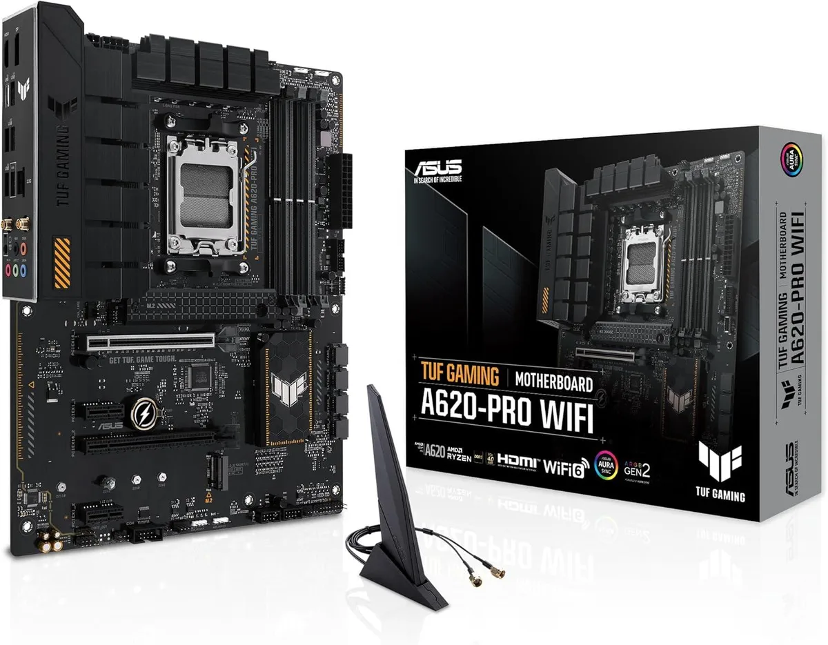 Rectangular ATX motherboard with black PCB and grey metal armour covering key components