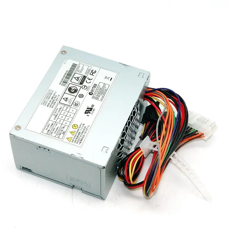 Rectangular silver ATX power supply unit with ventilation grille and cable bundle