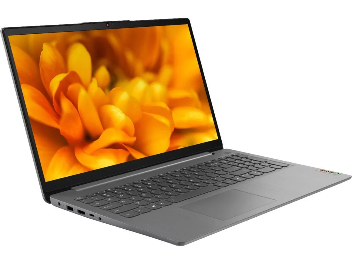 Silver-grey 15.6 inch touchscreen laptop, thin clamshell profile, full-size keyboard with number pad