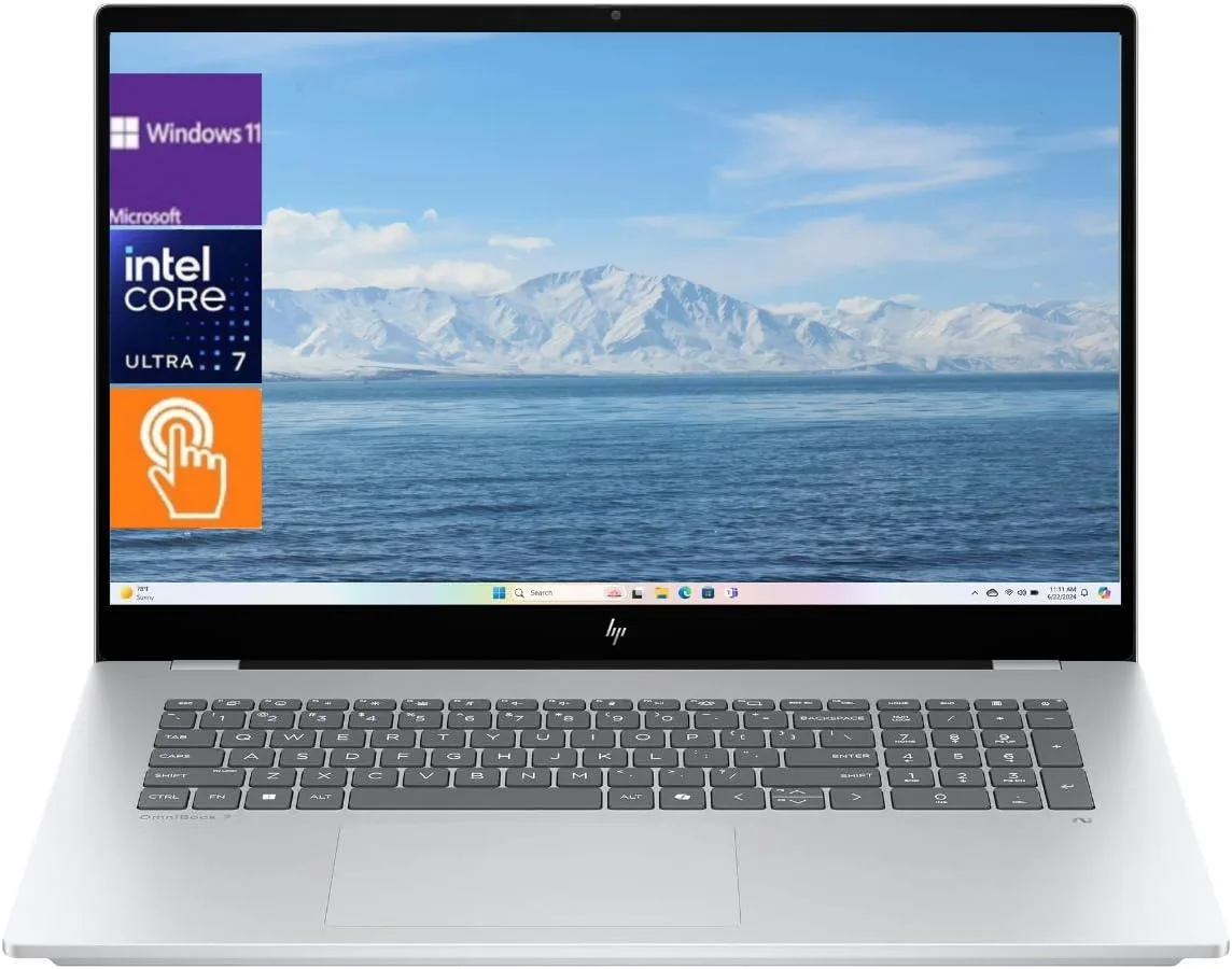 Silver 17.3 inch touchscreen laptop with thin bezels and full-size backlit keyboard