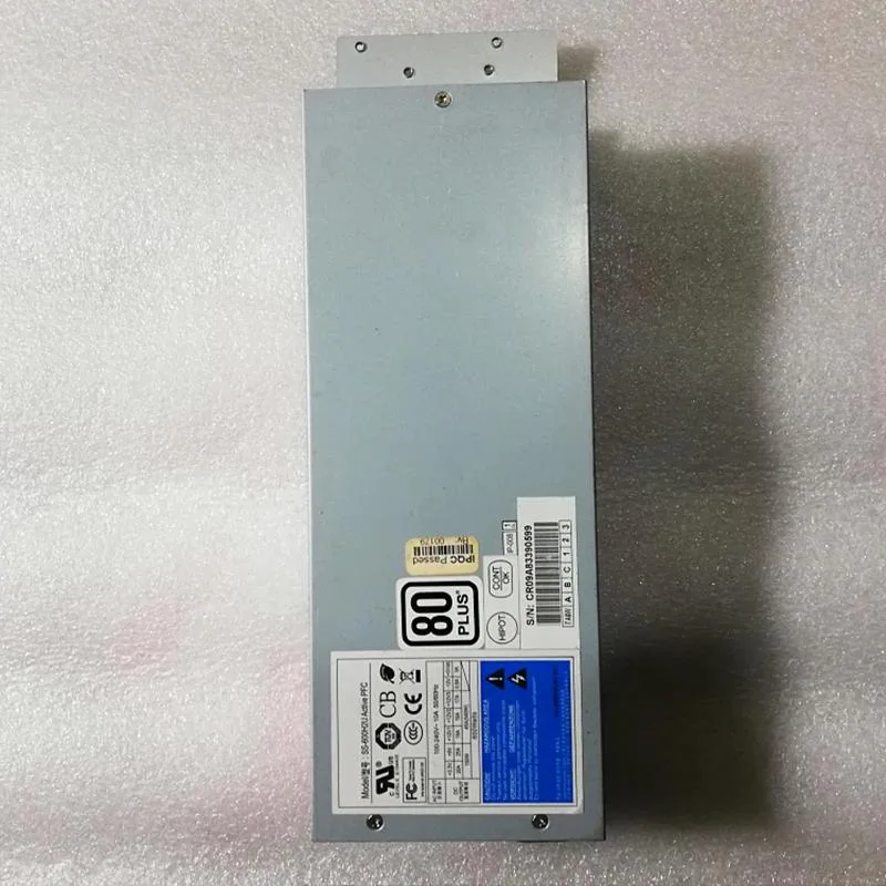 Silver 2U rackmount power supply unit with rear fan grille and cable bundle
