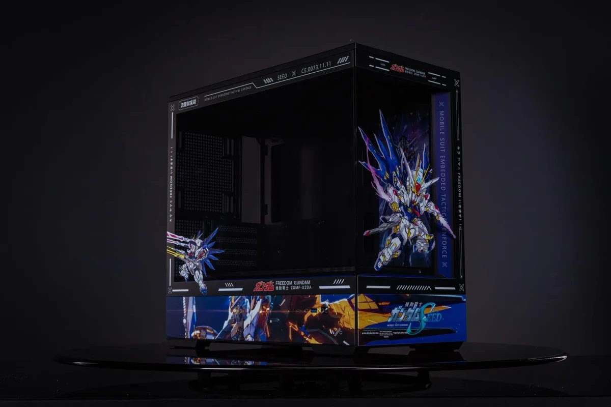 Black mid-tower case with tempered glass side panel and Gundam-themed accents