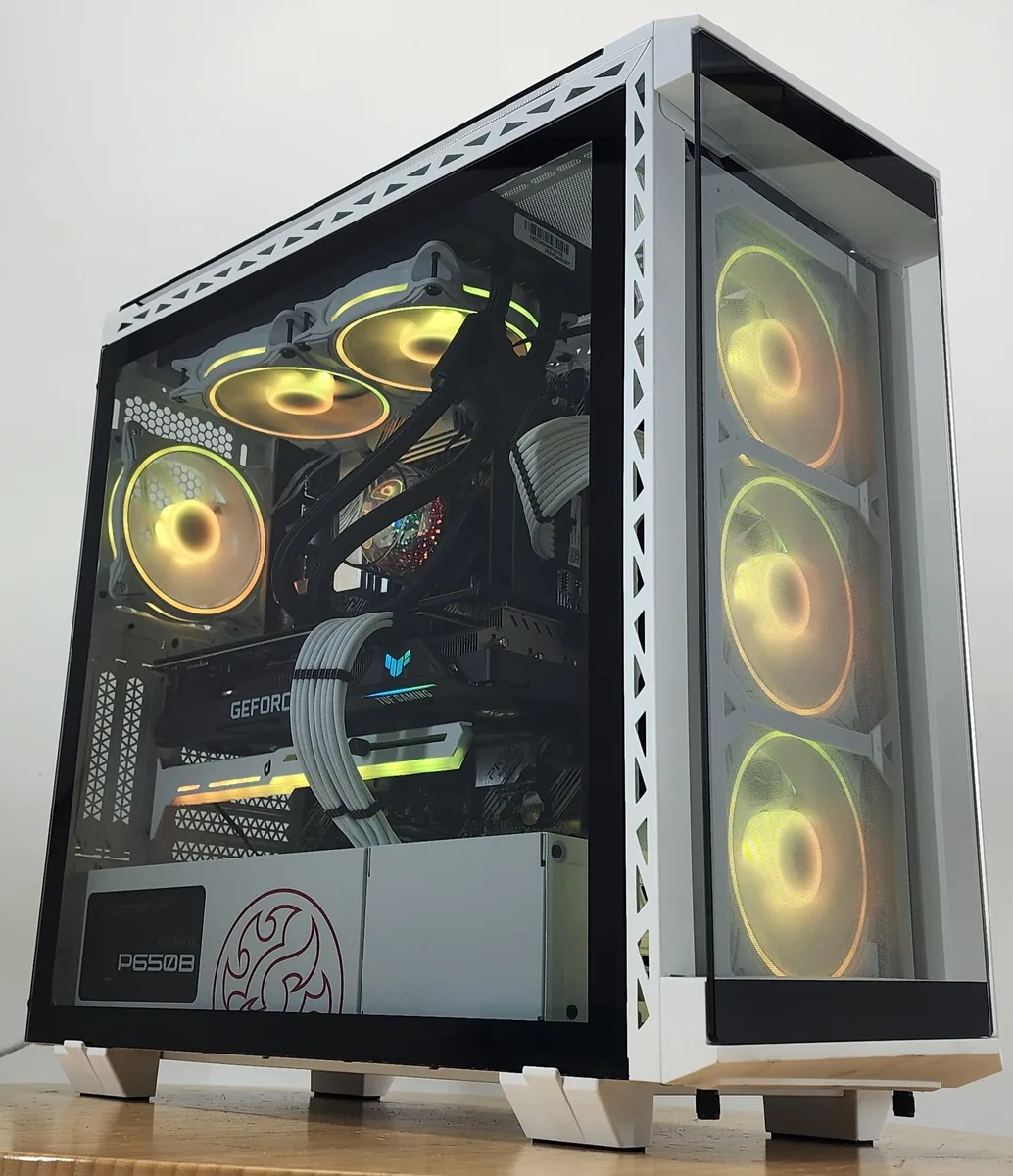 White mid-tower case with glass side panel showing RGB liquid cooler and graphics card