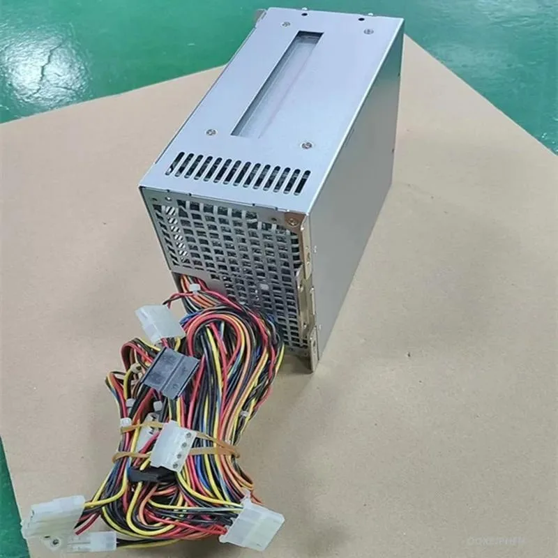 Rectangular black ATX power supply unit with cooling fan and cable connections