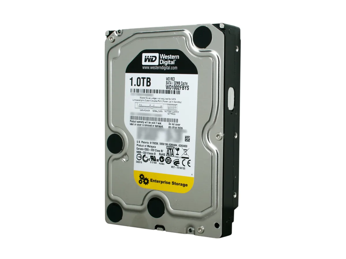 Silver 3.5 inch bare hard drive with green circuit board