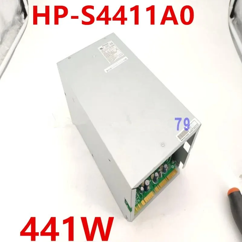 Silver metal rectangular ATX power supply unit with fan grille and label