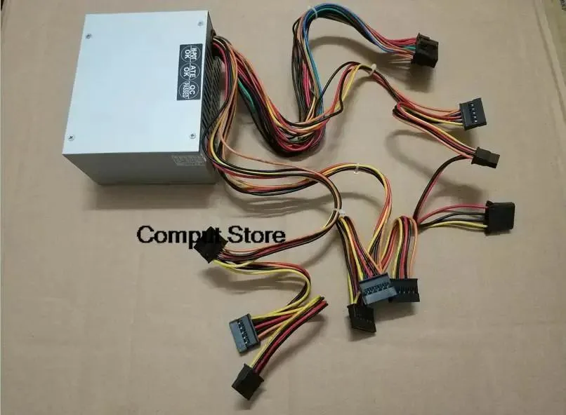 Compact SFX power supply unit with label showing model numbers 252 318 8250